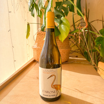 A bottle of white wine. The label reads: "Toscana Vermentino. L'Airone Guado al Melo."