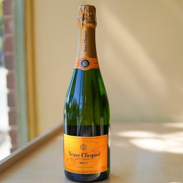 A bottle of Veuve Clicquot Brut Champagne.