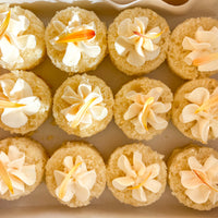A gift box of bite-sized cakes.