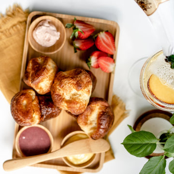 Cake Bloom's famous golden brown popovers are available each week. Order by the dozen with a selection of housemade sauces and butters for your next brunch.